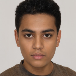 Neutral latino young-adult male with short  brown hair and brown eyes