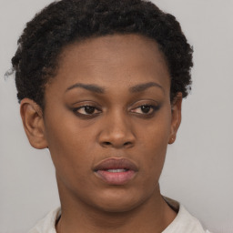 Neutral black young-adult female with short  brown hair and brown eyes