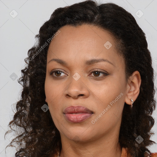 Joyful black young-adult female with medium  brown hair and brown eyes