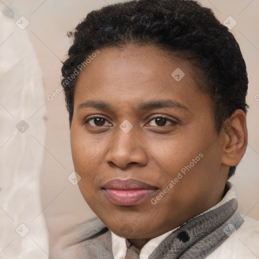 Joyful black young-adult female with short  brown hair and brown eyes