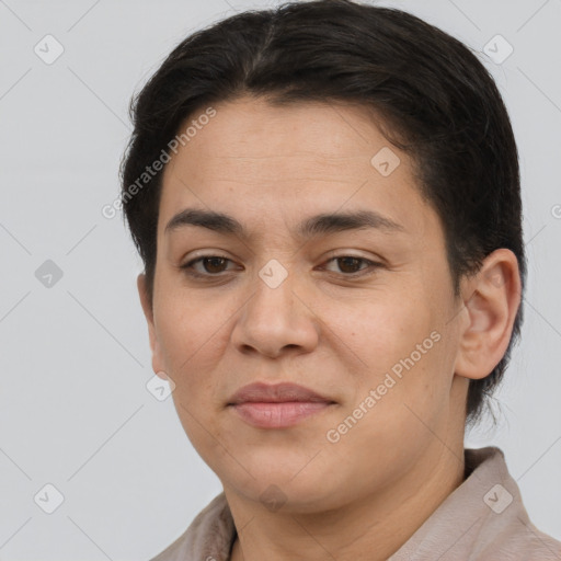 Joyful latino young-adult female with short  brown hair and brown eyes