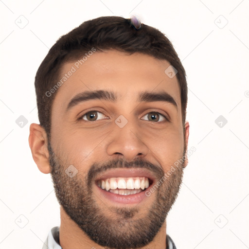 Joyful latino young-adult male with short  black hair and brown eyes