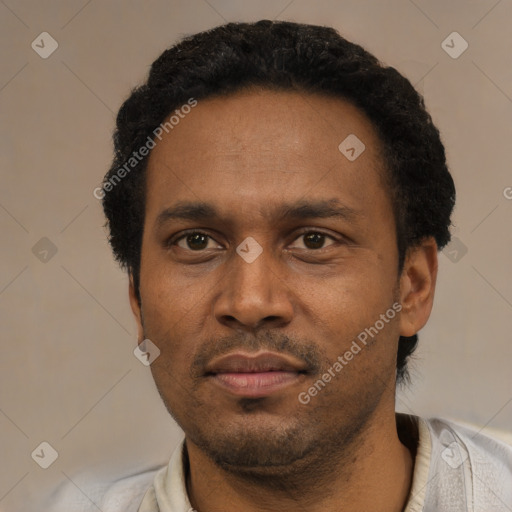 Neutral latino adult male with short  black hair and brown eyes