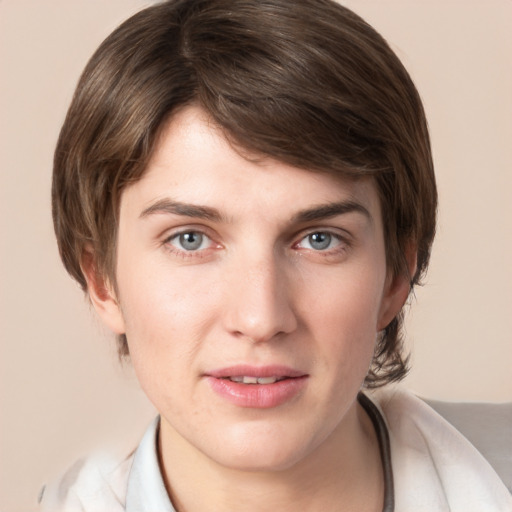 Joyful white young-adult male with medium  brown hair and grey eyes