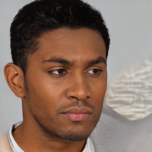 Neutral black young-adult male with short  brown hair and brown eyes