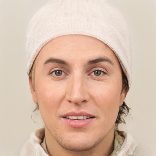 Joyful white adult female with short  brown hair and grey eyes