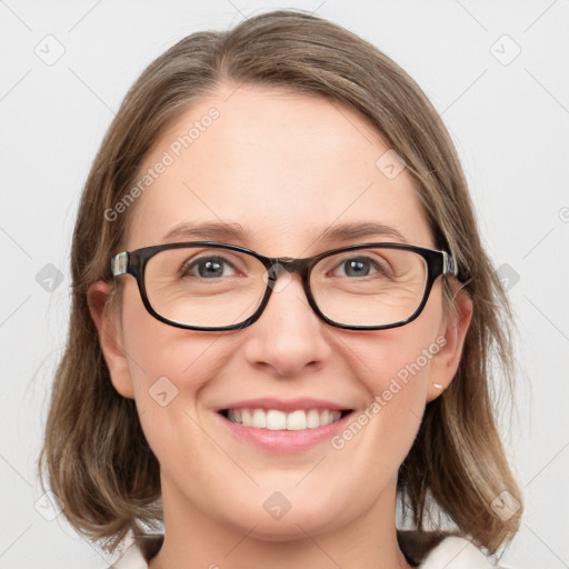 Joyful white young-adult female with medium  brown hair and blue eyes