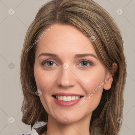 Joyful white young-adult female with medium  brown hair and green eyes