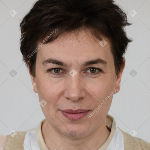 Joyful white adult female with short  brown hair and brown eyes