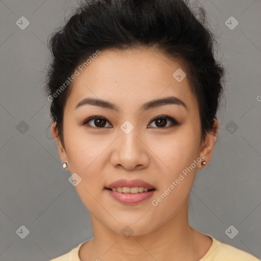 Joyful latino young-adult female with short  brown hair and brown eyes