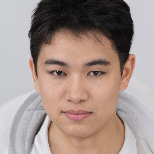 Neutral asian young-adult male with short  brown hair and brown eyes