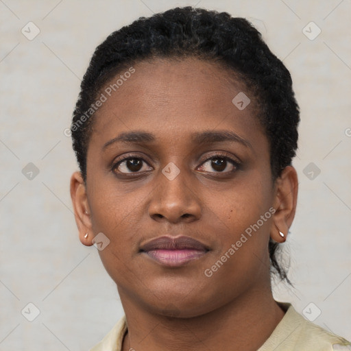 Neutral black young-adult female with short  brown hair and brown eyes