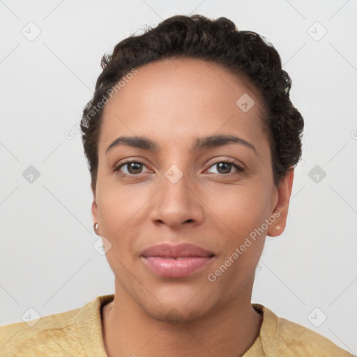 Joyful white young-adult female with short  black hair and brown eyes