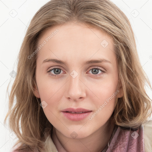 Joyful white young-adult female with long  brown hair and blue eyes