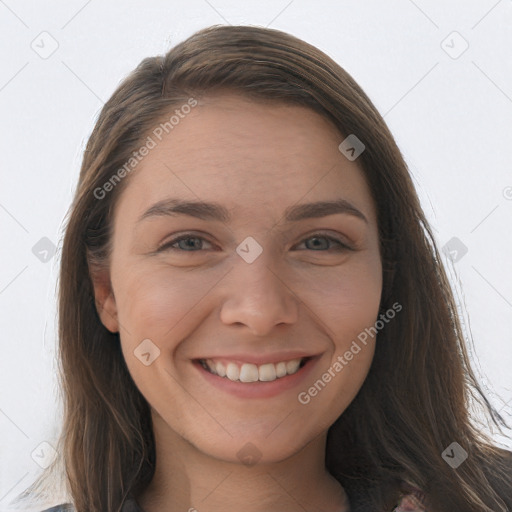 Joyful white young-adult female with long  brown hair and grey eyes