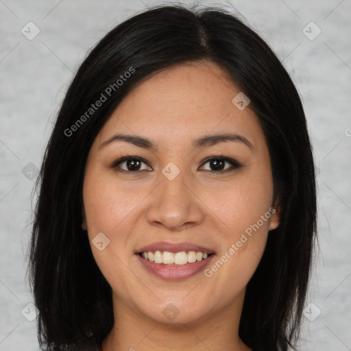 Joyful asian young-adult female with long  brown hair and brown eyes