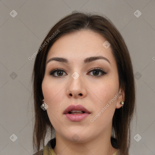 Neutral white young-adult female with long  brown hair and brown eyes