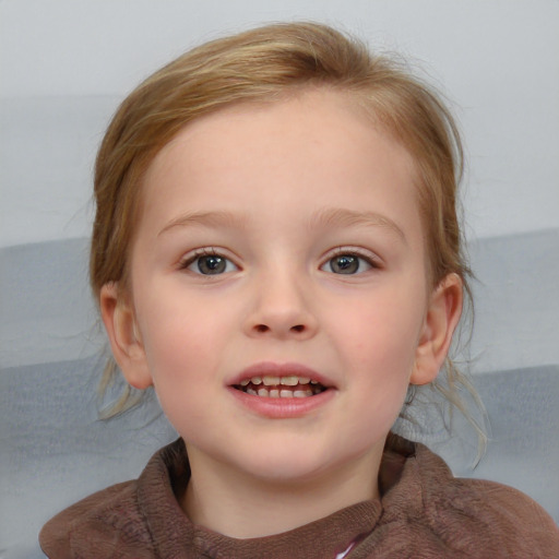 Joyful white child female with medium  brown hair and blue eyes