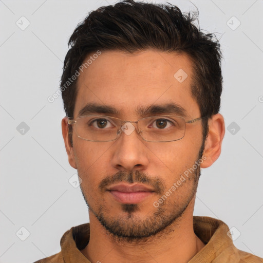 Neutral white young-adult male with short  black hair and brown eyes