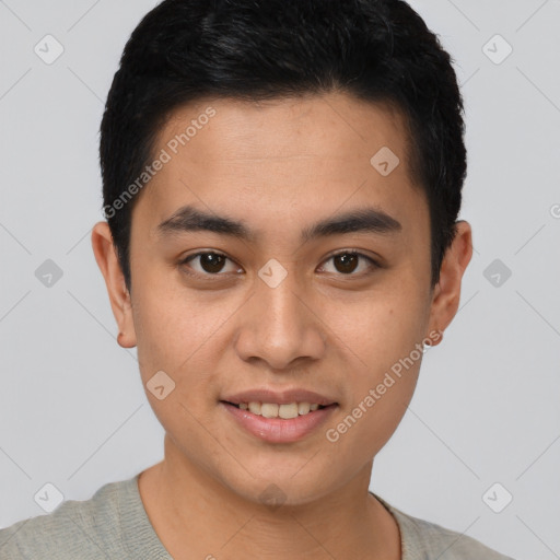 Joyful latino young-adult male with short  brown hair and brown eyes