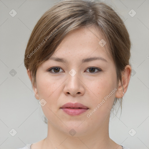 Joyful white young-adult female with medium  brown hair and grey eyes