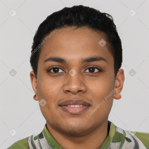 Joyful black young-adult female with short  black hair and brown eyes