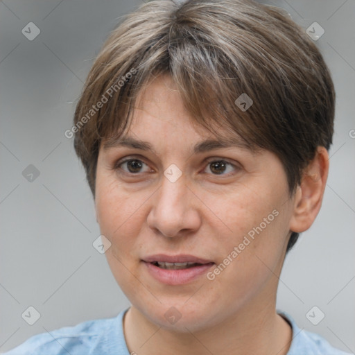 Joyful white adult female with short  brown hair and brown eyes