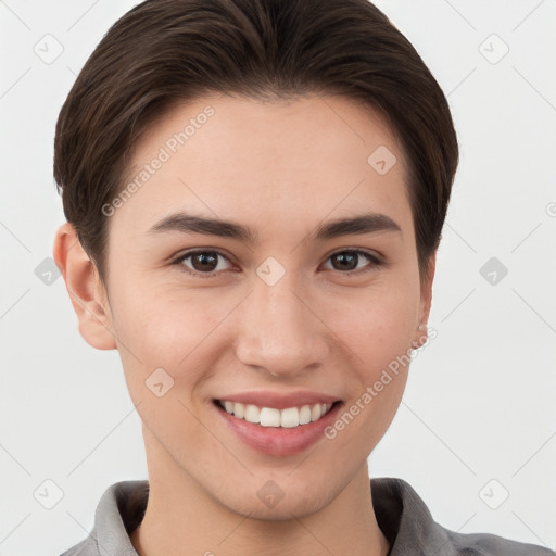 Joyful white young-adult female with short  brown hair and brown eyes