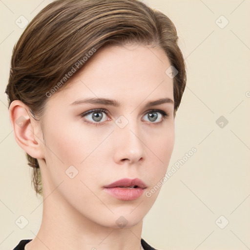 Neutral white young-adult female with medium  brown hair and grey eyes