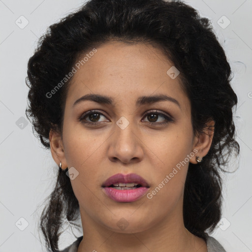 Joyful latino young-adult female with medium  black hair and brown eyes