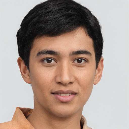 Joyful latino young-adult male with short  black hair and brown eyes