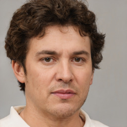 Neutral white adult male with short  brown hair and brown eyes