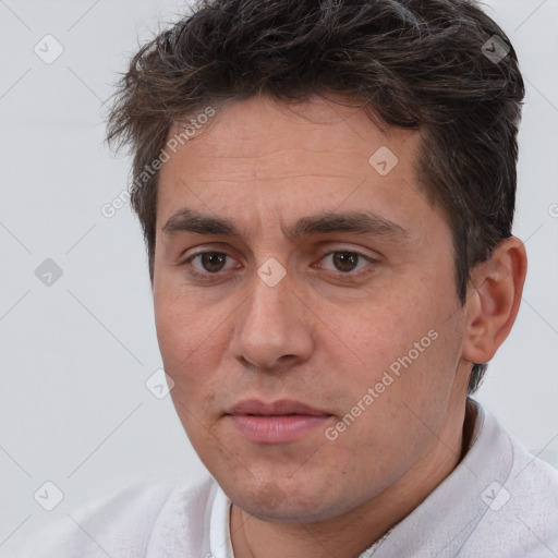 Neutral white adult male with short  brown hair and brown eyes