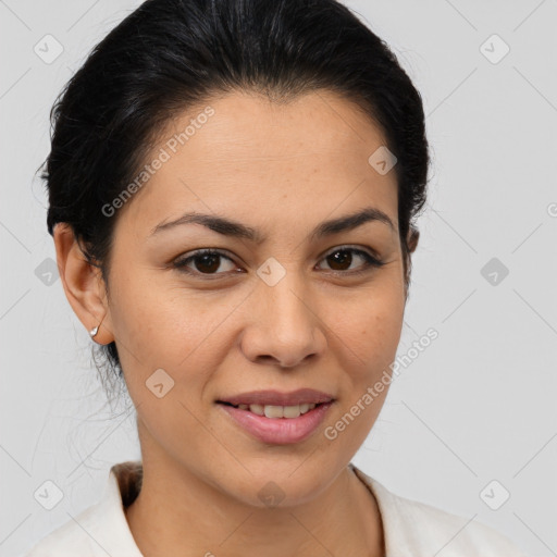 Joyful latino young-adult female with medium  brown hair and brown eyes