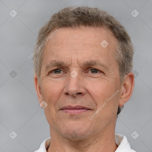 Joyful white middle-aged male with short  brown hair and brown eyes