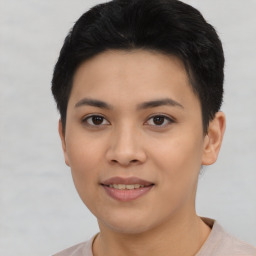 Joyful asian young-adult female with short  black hair and brown eyes