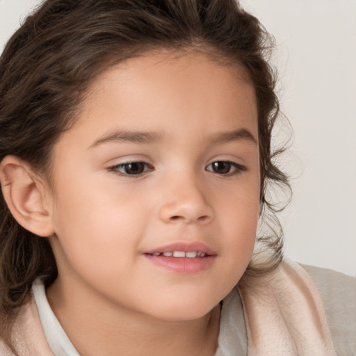 Joyful white child female with medium  brown hair and brown eyes