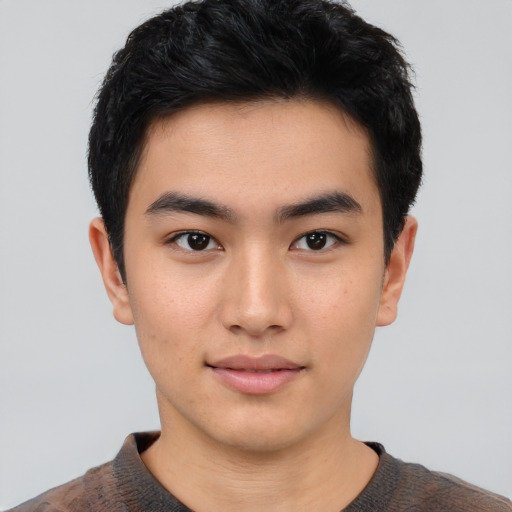 Neutral asian young-adult male with short  black hair and brown eyes