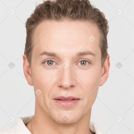 Joyful white adult male with short  brown hair and grey eyes