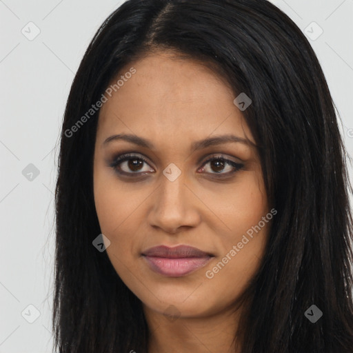 Joyful latino young-adult female with long  black hair and brown eyes