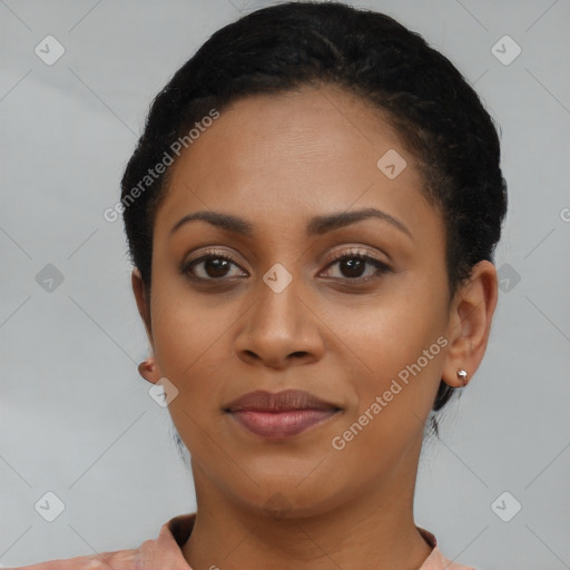 Joyful latino young-adult female with short  brown hair and brown eyes