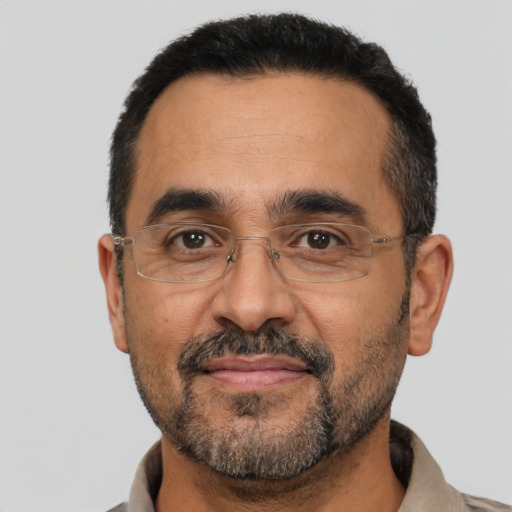 Neutral latino adult male with short  black hair and brown eyes