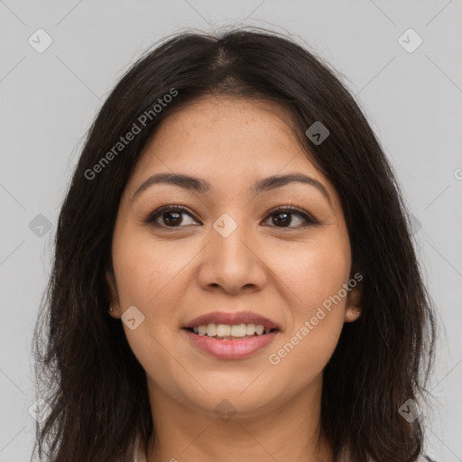 Joyful latino young-adult female with long  brown hair and brown eyes