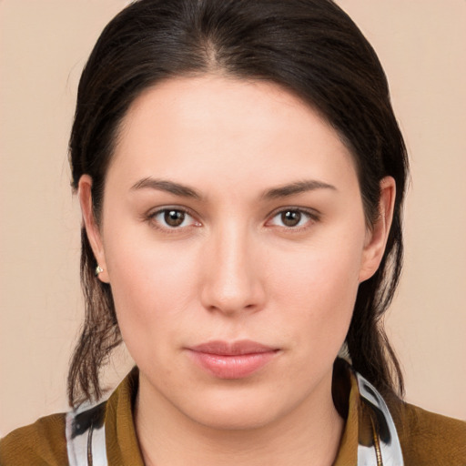 Neutral white young-adult female with medium  brown hair and brown eyes