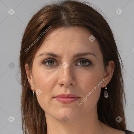 Joyful white adult female with medium  brown hair and brown eyes