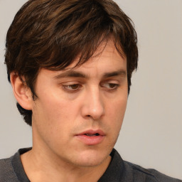 Neutral white adult male with short  brown hair and brown eyes