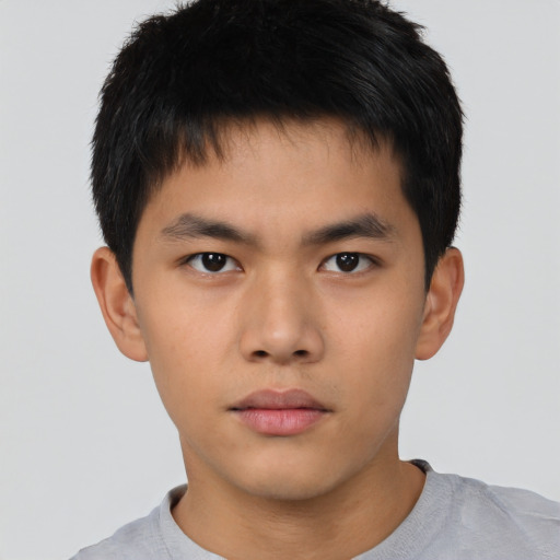 Neutral asian young-adult male with short  brown hair and brown eyes