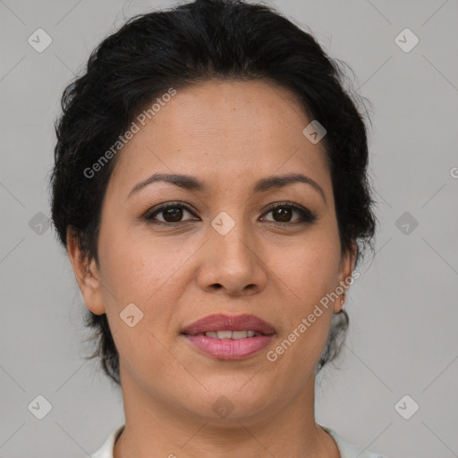 Joyful latino adult female with short  brown hair and brown eyes