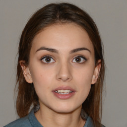 Neutral white young-adult female with medium  brown hair and brown eyes