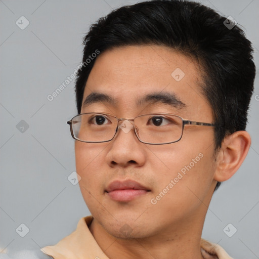 Neutral asian young-adult male with short  brown hair and brown eyes